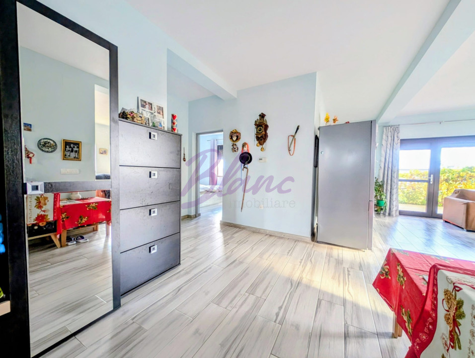 Casa cu teren  500 mp, front 20 m - Confort  intr-o zona in plina dezvoltare