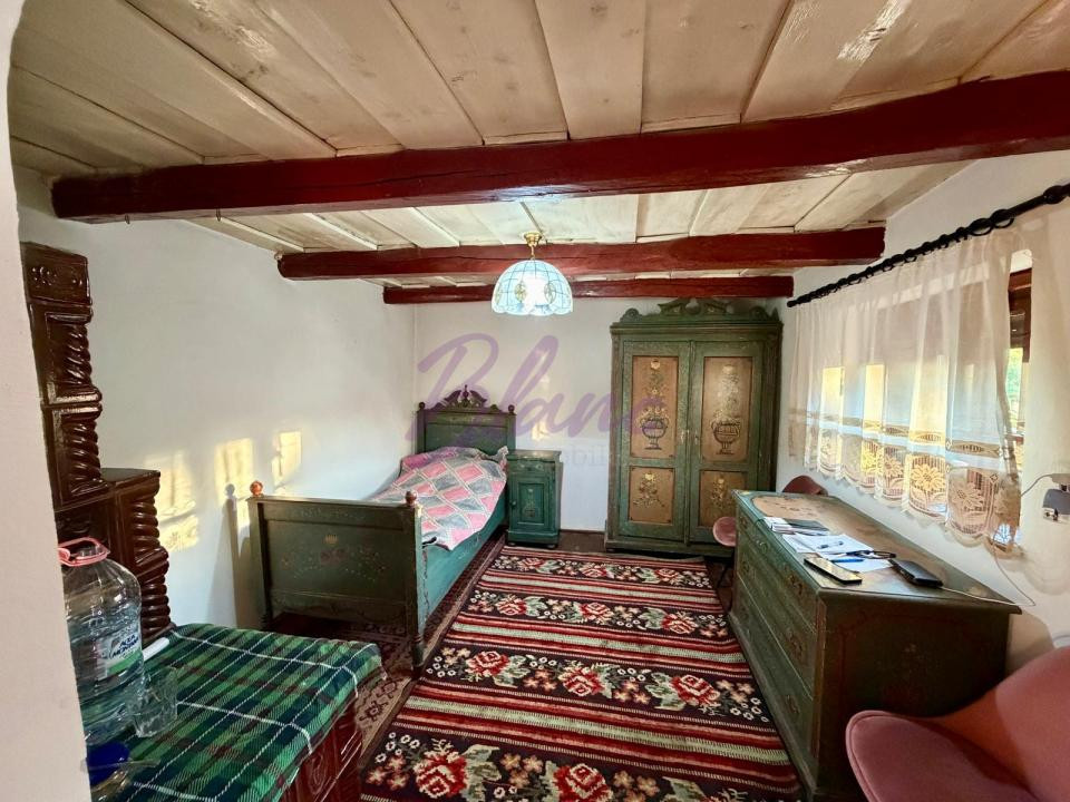 Casă cu 2 corpuri și teren 1.620 mp – Burzuc, Bihor